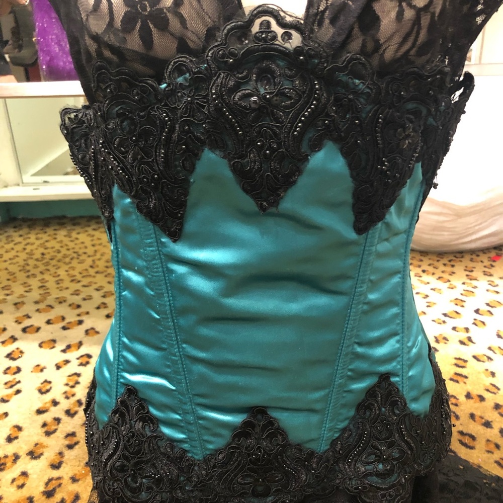 Large teal corset with black lace accents